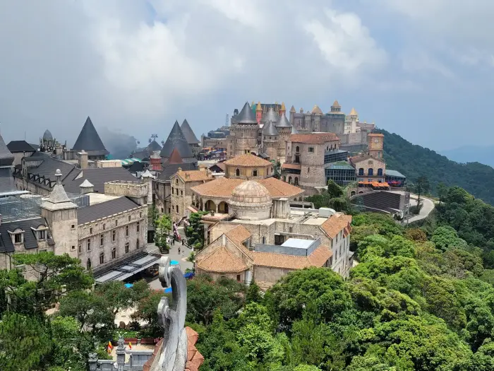 Ba Na Hills buildings on the mountain ridge above the forest