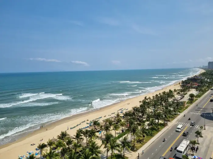 Long sandy beach and surf along the Da Nang coast